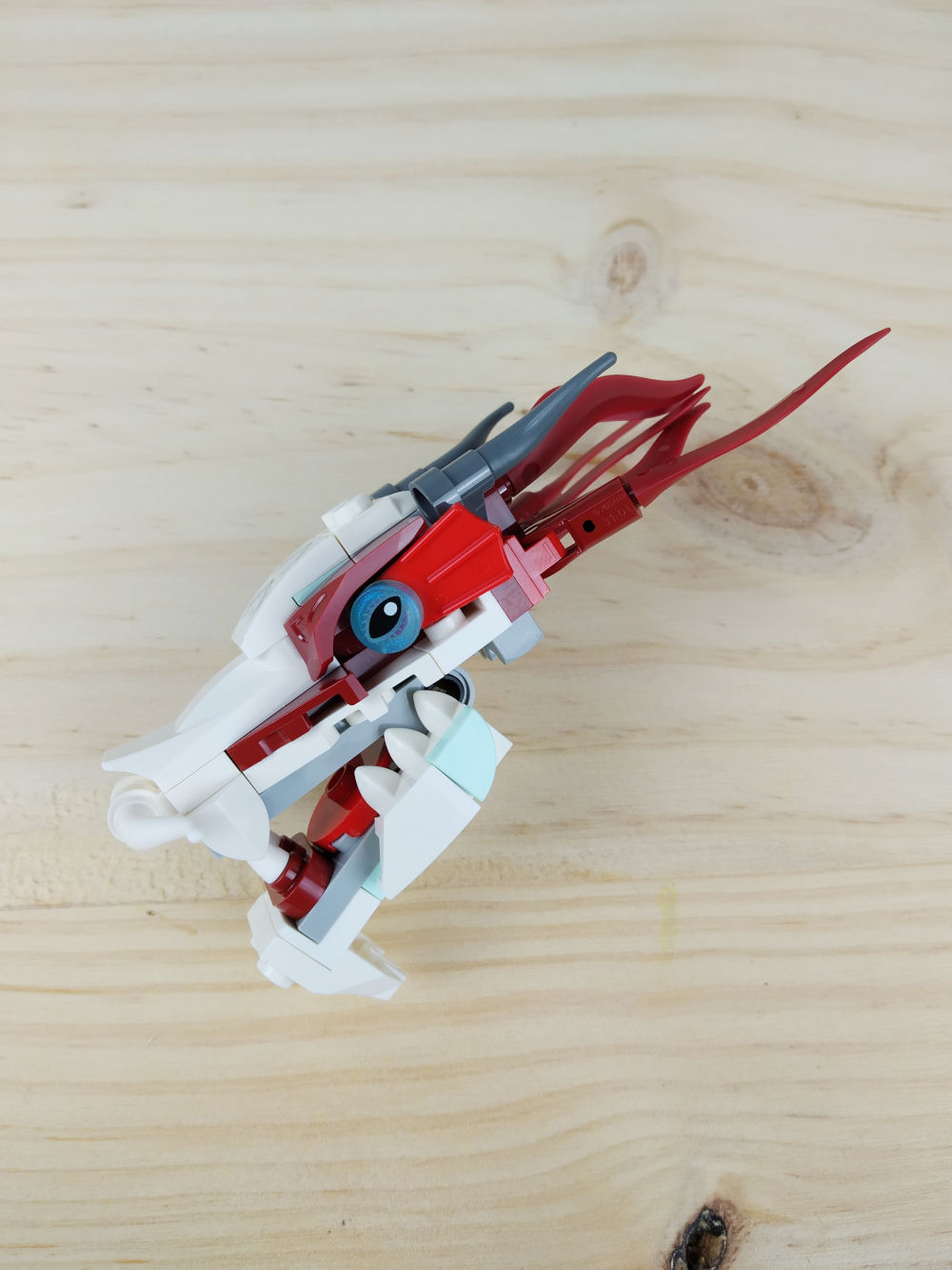 76177